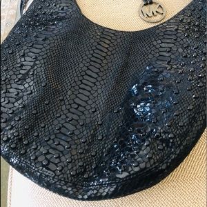 Python gorgeous black fringe Michael Kors bag.